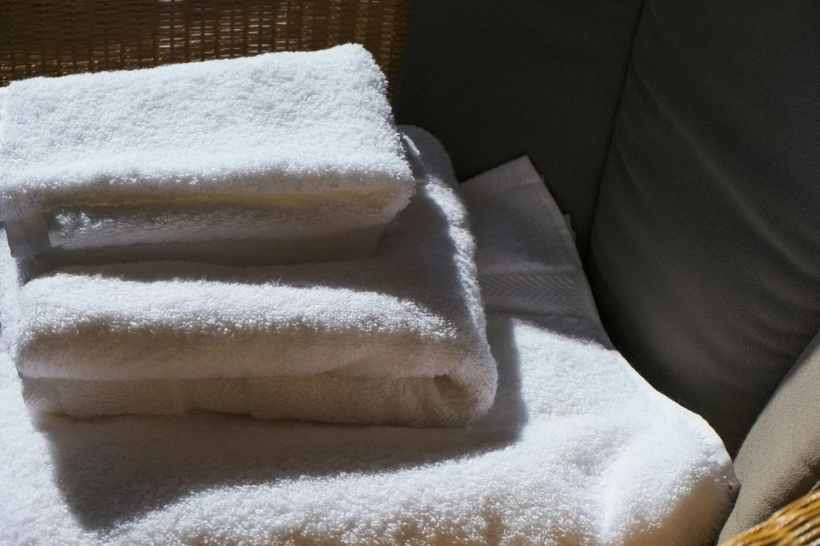 Fresh, neatly folded white towels